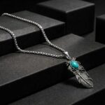 Vintage-Style Plume Pendant with Blue Stone