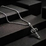 Antiqued Silver Skull Sword Pendant